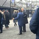 Pompey owner Michael Eisner with Andy Cullen in the Fratton Park fan zone today. Pic credit: Jeff Harris