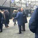 Pompey owner Michael Eisner with Andy Cullen in the Fratton Park fan zone today. Pic credit: Jeff Harris