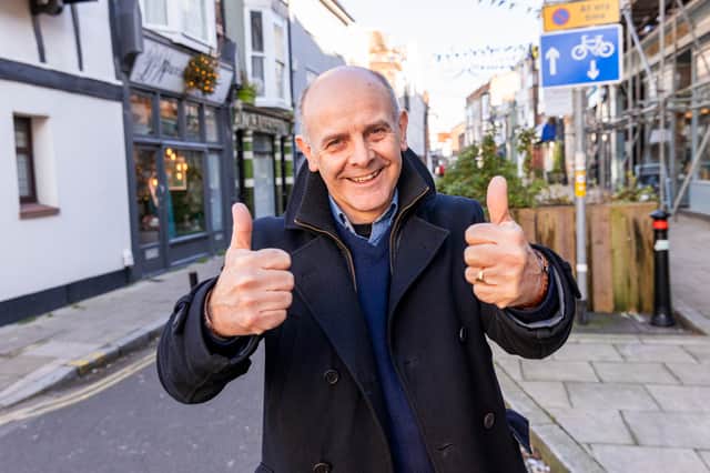 Richard Stidolph picks up the People's Postcode Lottery prize for wife Carole