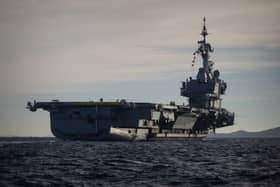British sailors deployed on the Royal navy vessel HMS Spey have joined the French Carrier Strike Group, lead by French aircraft carrier Charles-de-Gaulle, in the Indo-Pacific region for a "high-level" exercise. Pictured is the carrier in the the Mediterranean Sea off the coast of Toulon last year.
