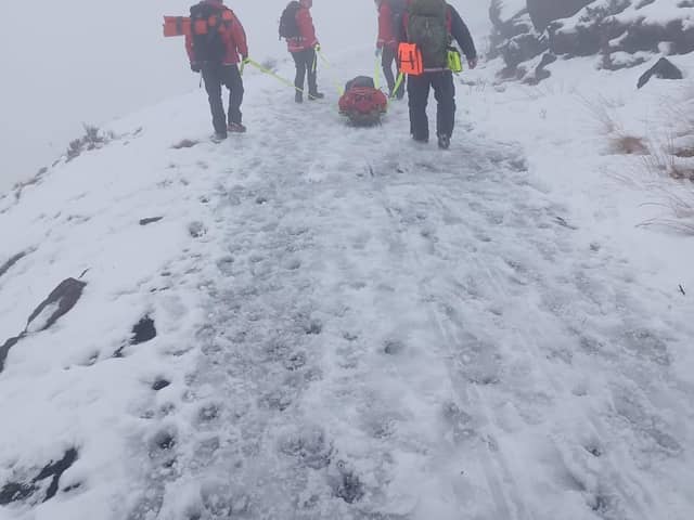 Injured man rescued from snow-covered mountain