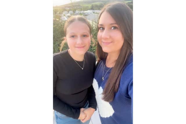 Charlotte Davies started the fundraiser and has been helped by her daughter Evie, 12, who was at the game on Saturday.