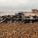 A washed up boat was set alight on West Beach in Hayling Island with the coastguard warning to stay away with "toxic gasses" harmful to pets.