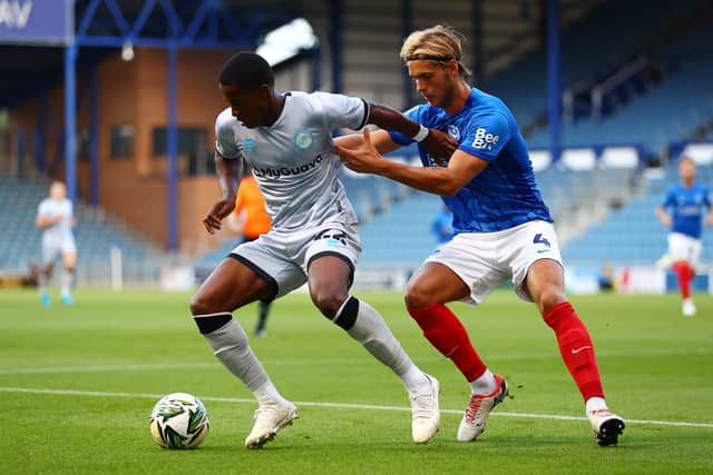 Ryley Towler (R) is wanted for a loan move by at least League One club.