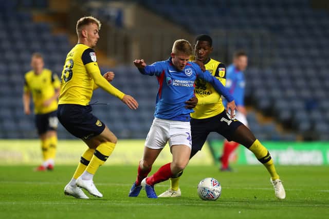 Mark Sykes (L) played against Pompey for Oxford United in League One. The now Bristol City winger has been subject of an offer from Stoke City.