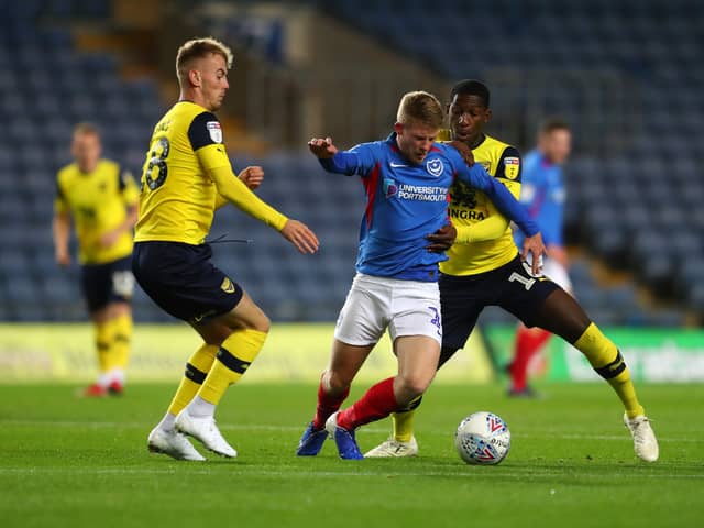 Mark Sykes (L) played against Pompey for Oxford United in League One. The now Bristol City winger has been subject of an offer from Stoke City. 