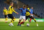 Mark Sykes (L) played against Pompey for Oxford United in League One. The now Bristol City winger has been subject of an offer from Stoke City. 