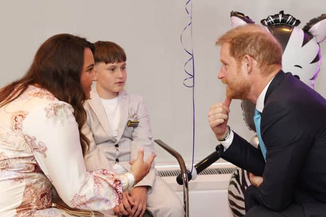 Jude Allen and his mum Kellie meeting Prince Harry at last year's awards
