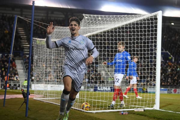 Mihailo Ivanovic celebrates scoring Millwall's winner against Portsmouth on Tuesday night