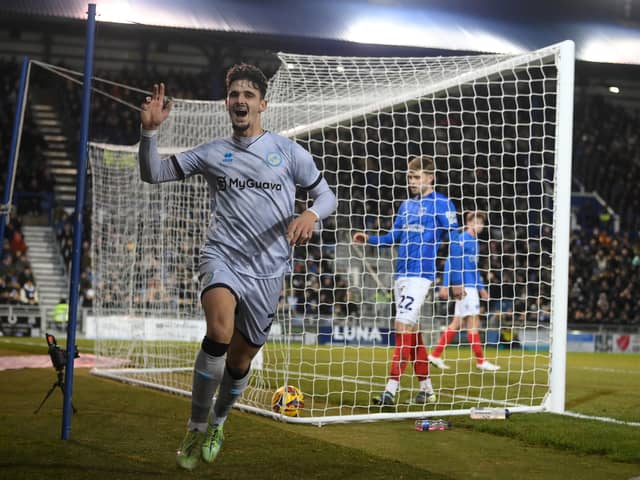 Mihailo Ivanovic celebrates scoring Millwall's winner against Portsmouth on Tuesday night