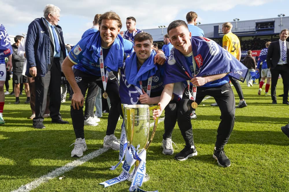 Pompey's League One title winner Tom Lowery, right, has agreed a Fratton exit to join Crewe.