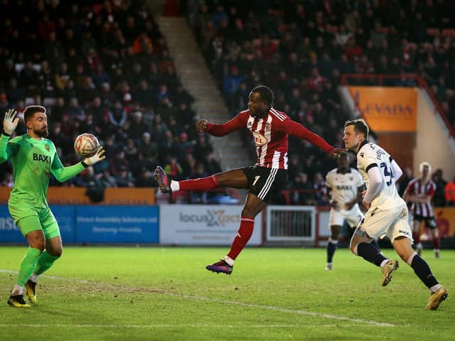 Millenic Alli is being linked with a move to Luton Town. He's currently with Exeter City. 