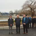Front centre: Cllr Leader and Forton Ward Councillor Peter Chegwyn, standing next to (left) Steve Fitzmaurice, Engineering Team Manager for Coastal Partners, and (right) Alister Butcher, Director of Estates and Safety at Lighthouse Learning Trust.

Back: Representatives from Coastal Partners, the construction team and the Environment Agency at the completed Forton defences.