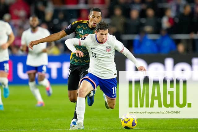 Pompey's Issac Hayden on international duty for Jamaica.