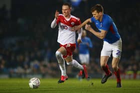 Cauley Woodrow (L) has left Pompey's relegation rivalsLuton Town to join Blackburn Rovers on loan. Pompey host Blackburn on March 29.