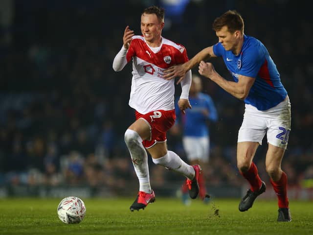 Cauley Woodrow (L) has left Pompey's relegation rivalsLuton Town to join Blackburn Rovers on loan. Pompey host Blackburn on March 29.