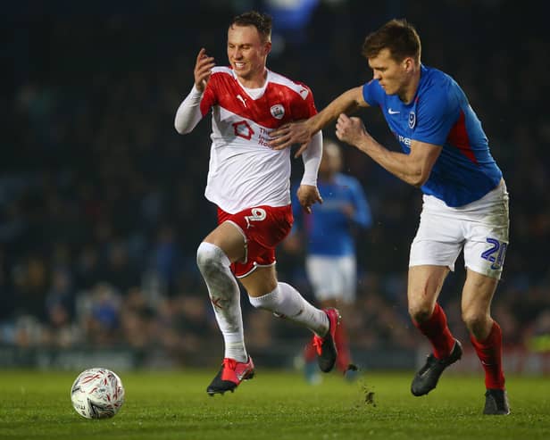 Cauley Woodrow (L) has left Pompey's relegation rivalsLuton Town to join Blackburn Rovers on loan. Pompey host Blackburn on March 29.