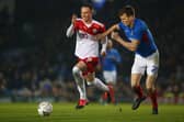 Cauley Woodrow (L) has left Pompey's relegation rivalsLuton Town to join Blackburn Rovers on loan. Pompey host Blackburn on March 29.