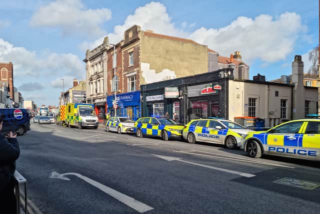 Police and ambulances in London Road after suspected stabbing