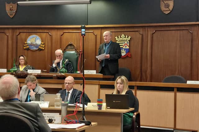 Gosport Borough Council leader Peter Chegwyn (standing) has hit out at the government's reorganisation plans which could see his authority abolished