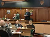 Gosport Borough Council leader Peter Chegwyn (standing) has hit out at the government's reorganisation plans which could see his authority abolished