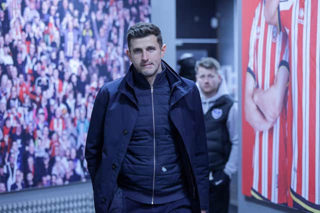 John Mousinho was gutted after Pompey's 2-1 defeat at Sheffield United. Picture: Jez Tighe