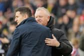 Sheffield United manager Chris Wilder and Pompey boss John Mousinho. Pic: Jez Tighe/ProSportsImages