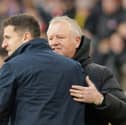Sheffield United manager Chris Wilder and Pompey boss John Mousinho. Pic: Jez Tighe/ProSportsImages