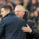 Sheffield United manager Chris Wilder and Pompey boss John Mousinho. Pic: Jez Tighe/ProSportsImages