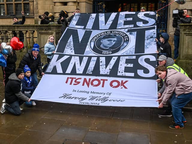 Pompey fans with a banner for Harvey Willgroose 