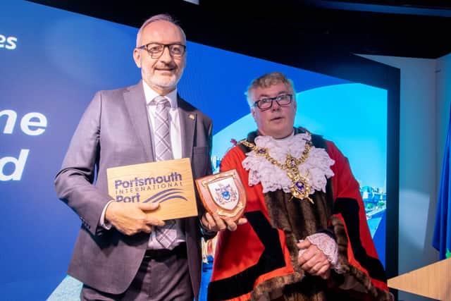 Christophe Mathieu, CEO of Brittany Ferries and Lord Mayor of Portsmouth, Jason Fazackarley, at the traditional plaque exchange marking the first voyage from the city's port.