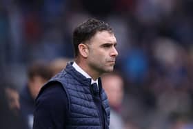 Omer Riza won't be on the touchline for Cardiff City's match with Pompey on Tuesday night.