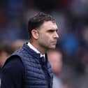 Omer Riza won't be on the touchline for Cardiff City's match with Pompey on Tuesday night.