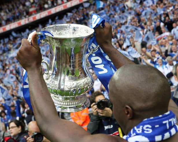 Lassana Diarra celebrates Pompey's 2008 FA Cup success. Picture: Joe Pepler