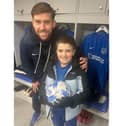 Dempsey Smith, 9, walked onto the Fratton Park pitch with Callum Lang on Tuesday nights 2-1 win over Cardiff.