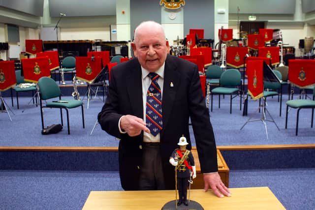 George Latham, a Falklands War veteran, with his treasured statue. The rare statue will be put on display at the Alfred Schools of Military Music at HMNB Portsmouth.