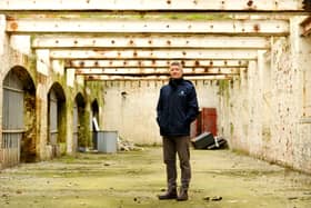 The old Royal Navy Rum Store, a 150-year-old Grade II listed building at Victoria Quay in Gosport, is due to be transformed into a mixed-use development with businesses  and a terrace rooftop bar. Pictured is: Ben Mason, portfolio manager for UK Docks Marine Services.