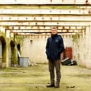The old Royal Navy Rum Store, a 150-year-old Grade II listed building at Victoria Quay in Gosport, is due to be transformed into a mixed-use development with businesses  and a terrace rooftop bar. Pictured is: Ben Mason, portfolio manager for UK Docks Marine Services.