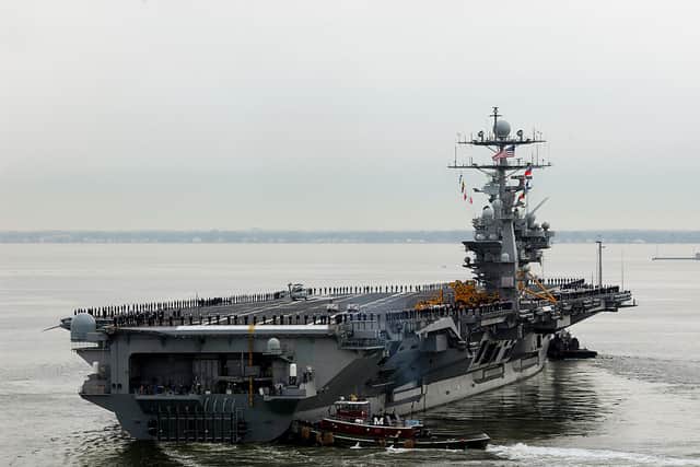 A fighter jet fell off the side of the American aircraft carrier USS Harry S. Truman while she was deployed in the Red Sea.