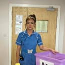 Beka Naylor at work. The NHS nurse, from Doncaster, was recovering from cancer treatment at Sheffield's Northern General Hospital when her car was stolen from outside her home. Photo: Beka Naylor/SWNS