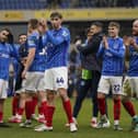 Pompey's Hayden Matthews, centre, earned the praise of John Mousinho after his man-of-the-match performance at Oxford United.