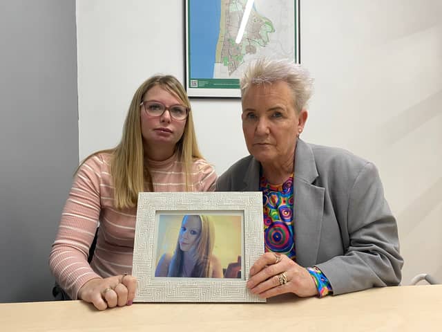 Katie Brett and Lorraine Beavers with a photo of Sasha Marsden.
