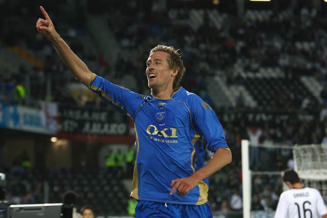Peter Crouch celebrates scoring in extra-time against Vitoria Guimaraes in October 2009