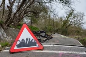 A road left so badly damaged by a landslip it was closed to cars can't be fixed properly - as it's still moving a YEAR later.  