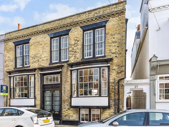 This home comes with three bedrooms, two bathrooms and one reception room as well as a garden. 