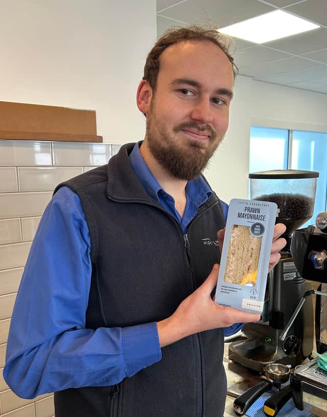 Café steward Reece Peacham and the seagull he rescued