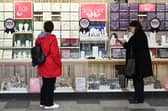 Two women look at a jewellery shop window in Stevenage, north of London, in 2024 (Photo: JUSTIN TALLIS/AFP via Getty Images)