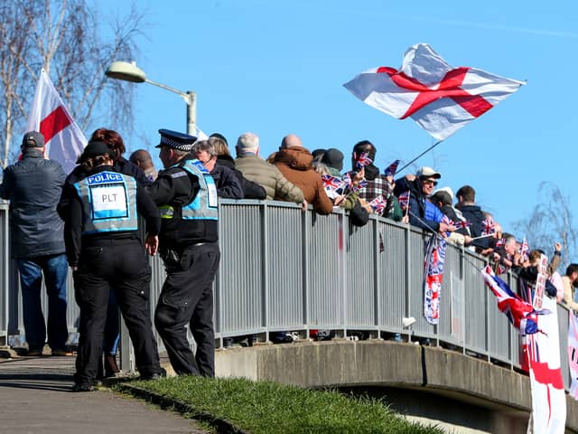 Protesters on the footbridge over Wallington Way