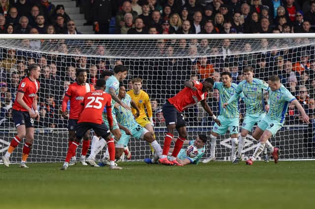 Pompey scramble the ball clear during their 1-0 defeat at Luton. Picture: Jason Brown/ProSportsImages