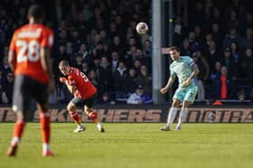 Marlon Pack heads clear a Luton attack in Pompey's 1-0 defeat. Picture: Jason Brown/ProSportsImages